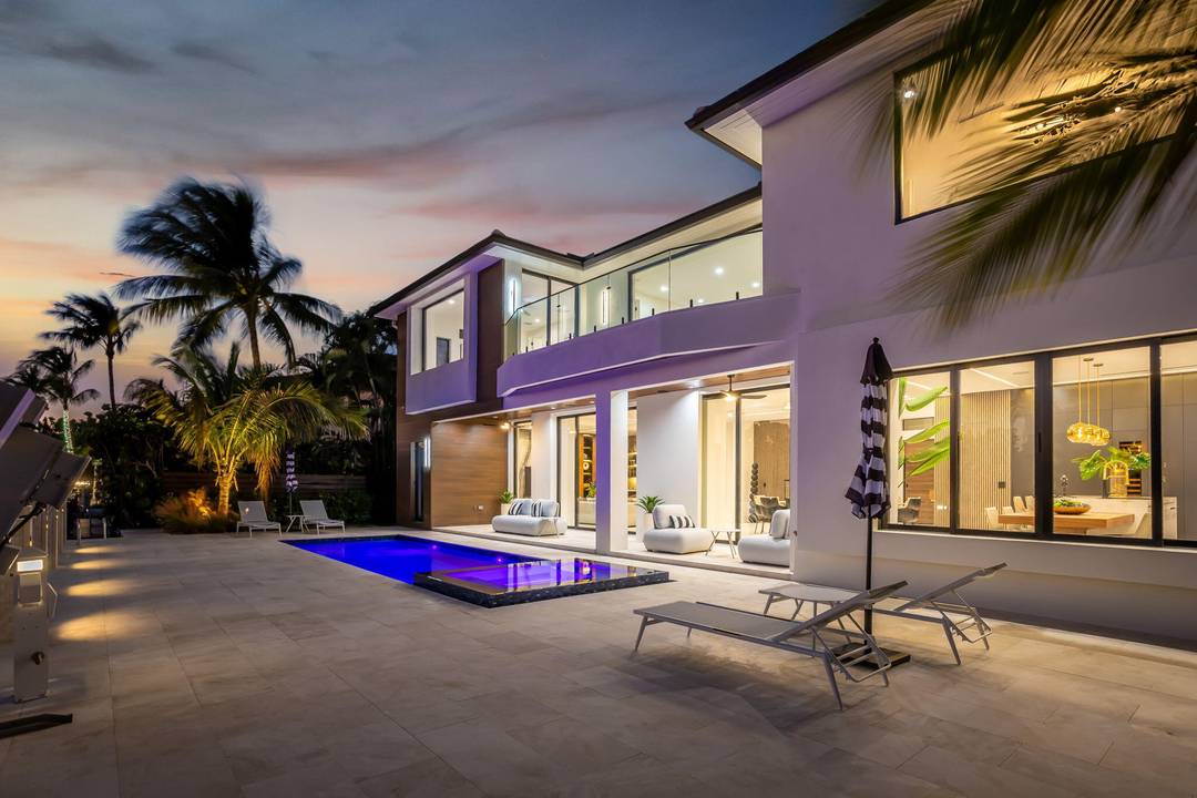 Completed in 2025, this modern waterfront residence offers 84' of deep water frontage, direct ocean access with no fixed bridges, and a private dock with a 20, 000 lb boat ...