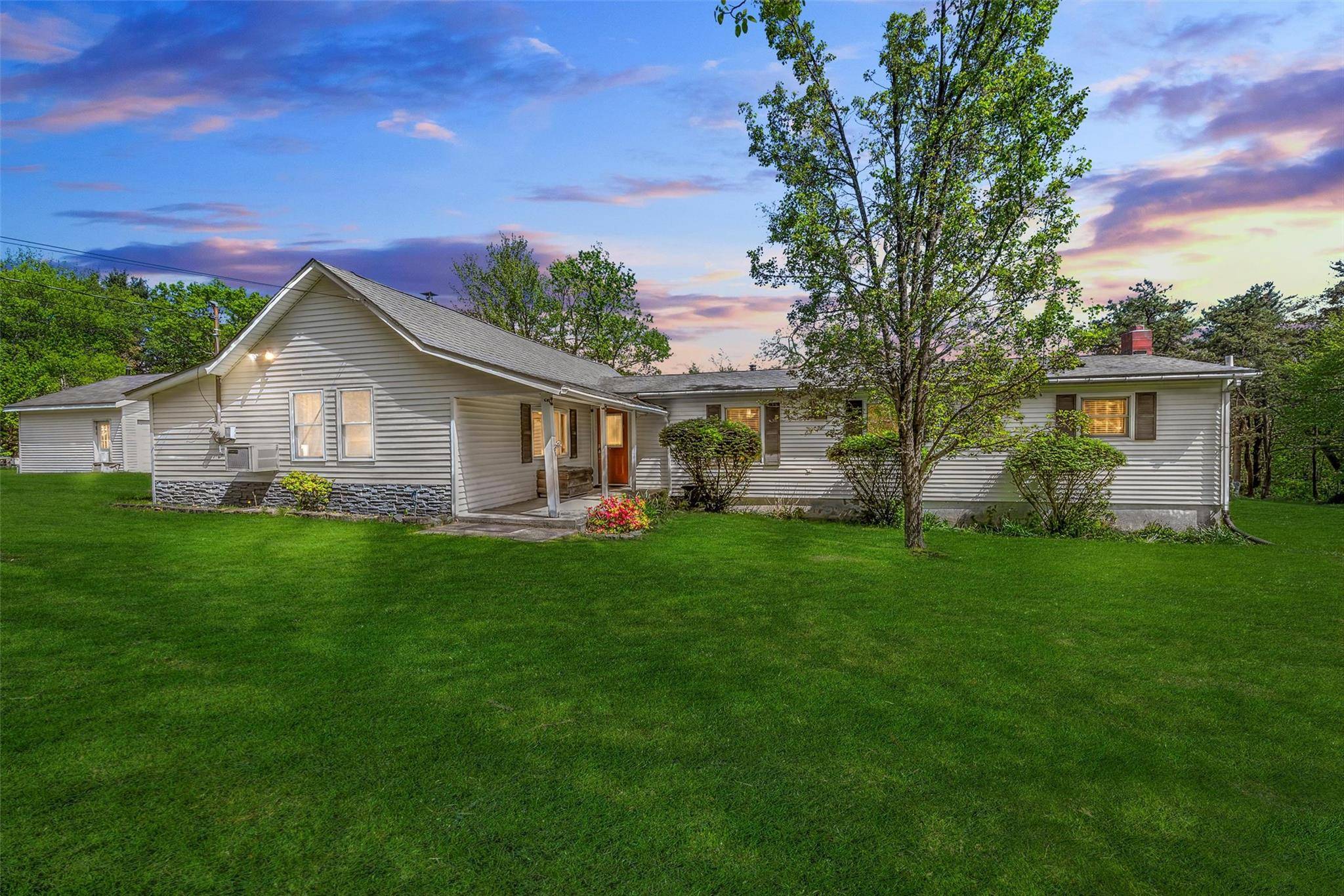 Escape to peace, privacy, and endless possibilities with this beautifully maintained 3 bedroom, 3 bath ranch home set on 104 stunning acres of countryside.