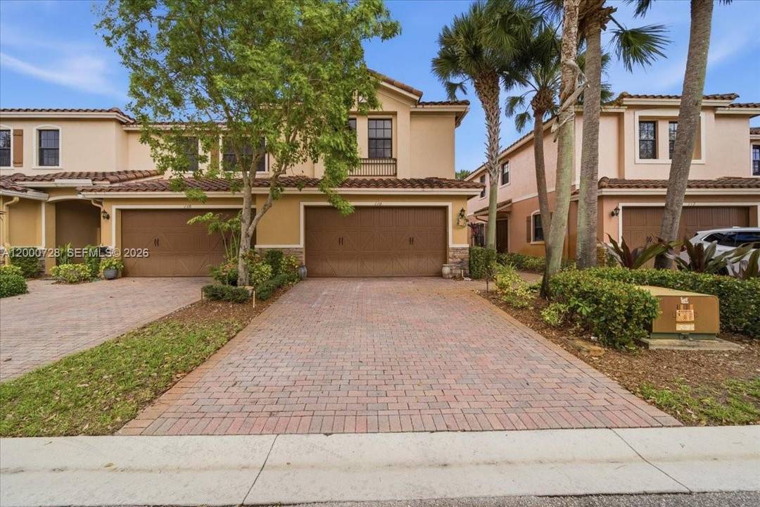 Corner townhouse in gated Riverwalk at Lago Mar with 3 bedrooms, 2.