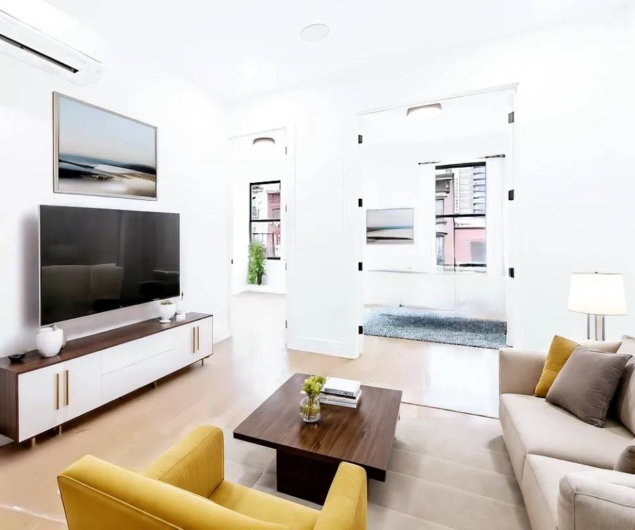 Beautiful sun soaked three bed two bath apartment is located in Prime Williamsburg and features an tall ceilings, central air, and hardwood floors throughout.