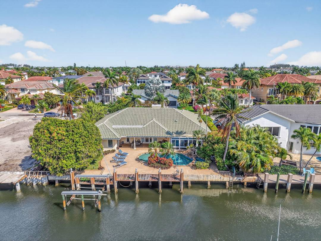 Located in the highly desirable boating community of Tropic Isle in East Delray Beach, this exceptional waterfront property presents a rare opportunity for both developers and end users alike.