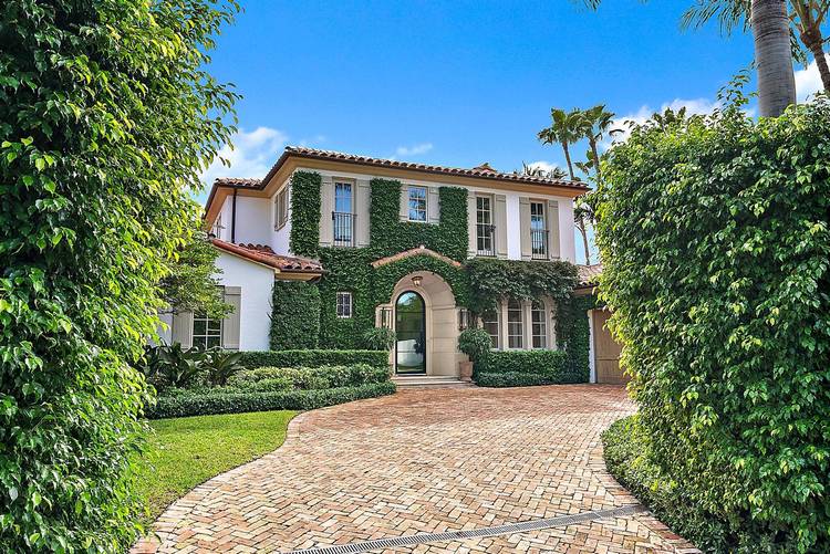 Dreamy Mediterranean style residence with easy ocean access amp ; Lake Trail access at the east amp ; west ends of the street.