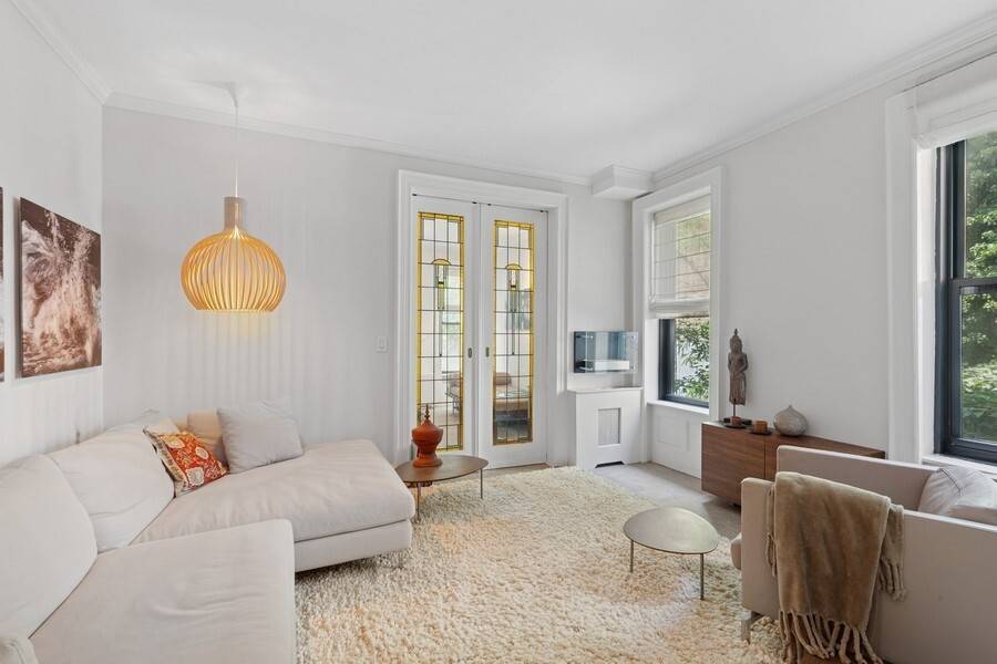 Featured in Architectural Digest, this impeccably maintained and uniquely designed home offers a serene blend of classic charm and modern sophistication an oasis tucked away in the heart of Chelsea.