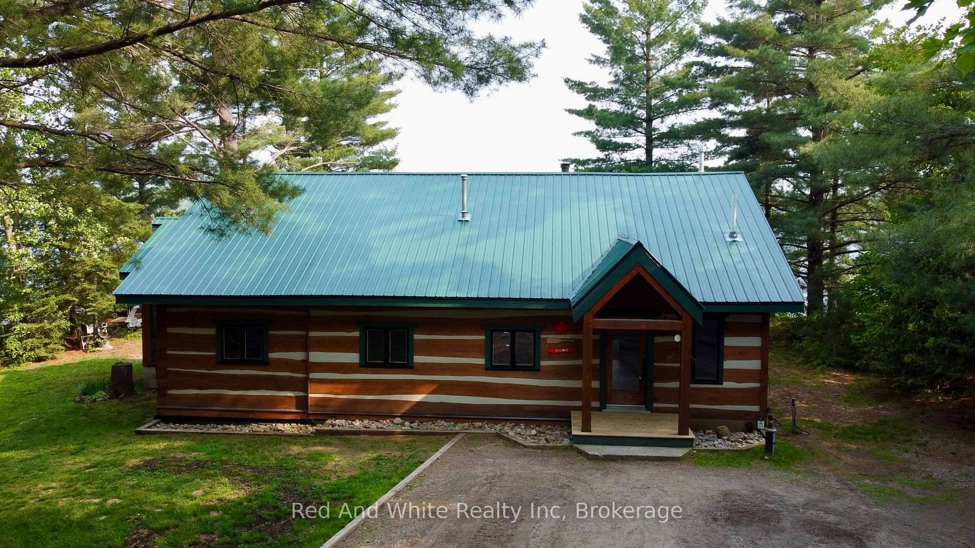 Welcome to the Lakehouse a year round off Grid, south facing, log home or cottage, nestled on the quiet shores of Meadow Lake aka Meads Lake.