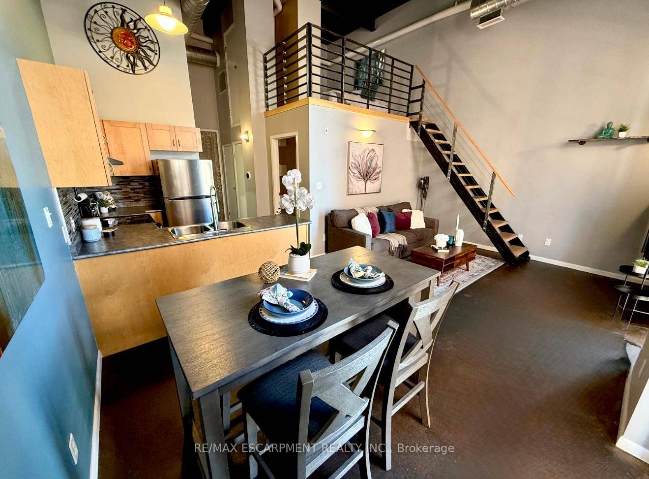 Welcome to Unit 406 at The Annex, an Impressive 2 Bedroom, 1 Bathroom Industrial Loft and Considered One of Hamilton's Most Desirable Boutique Condo Buildings.