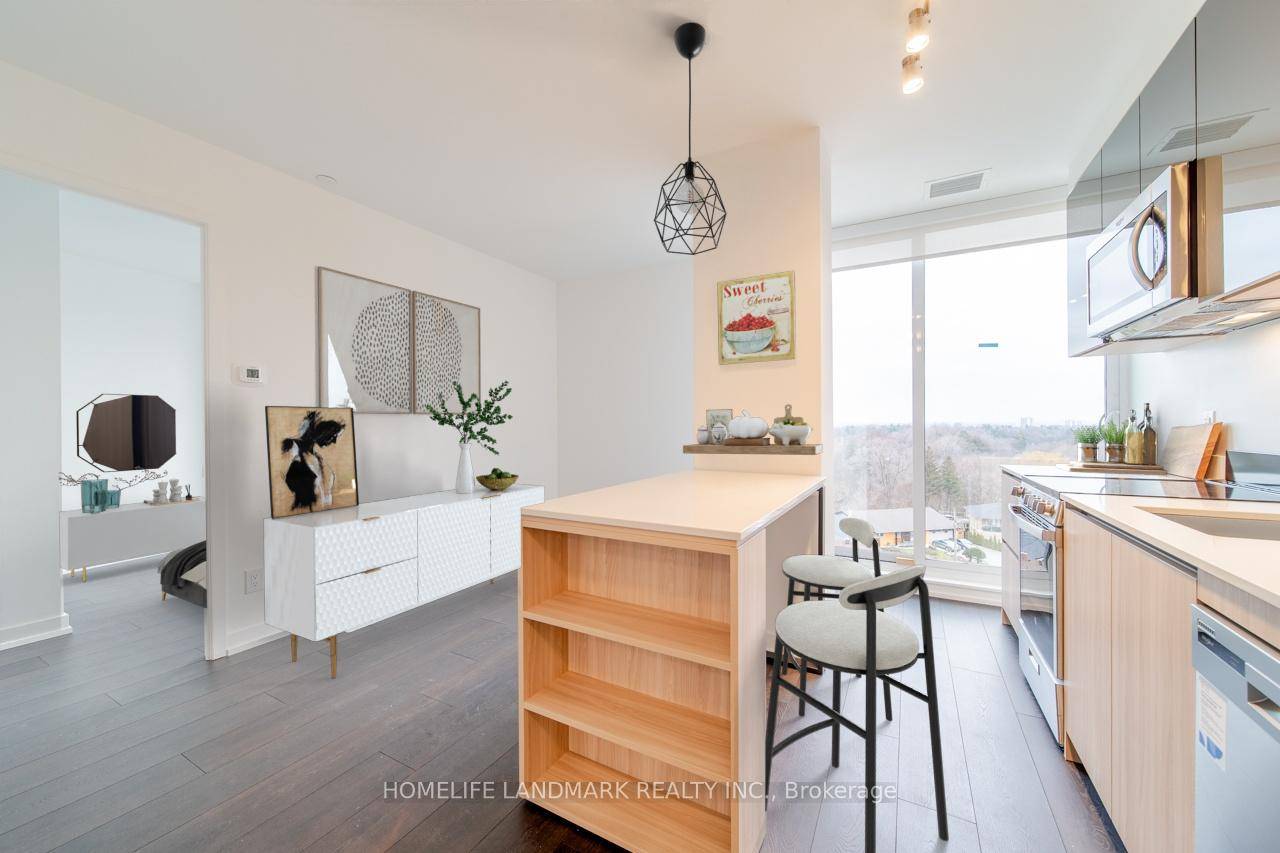 This Luxurious 2 Bedroom, 2 Bathroom Condo Unit Features A Modern Movable Island Kitchen.