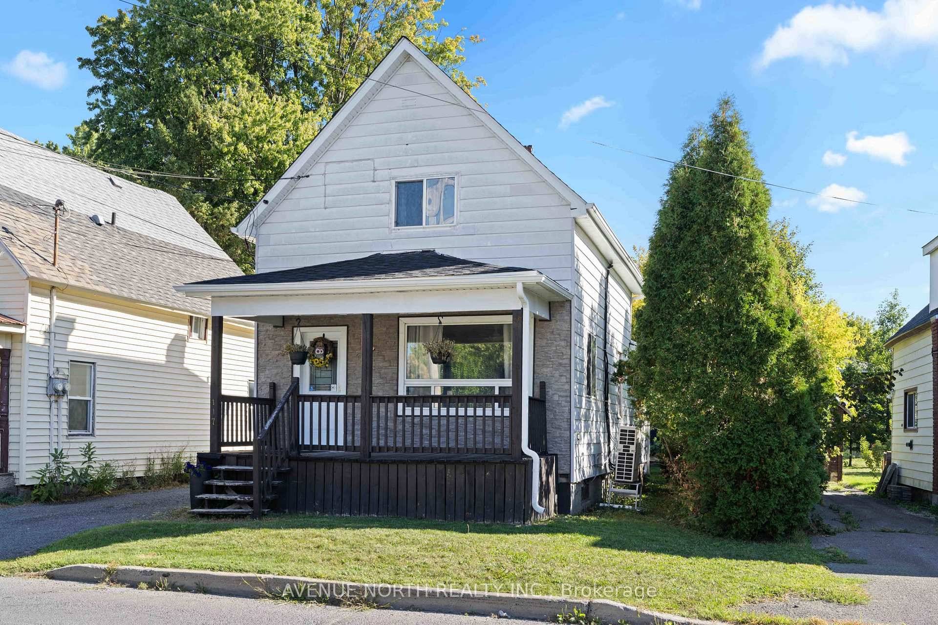 Charming single family home with detached 1 car garage.