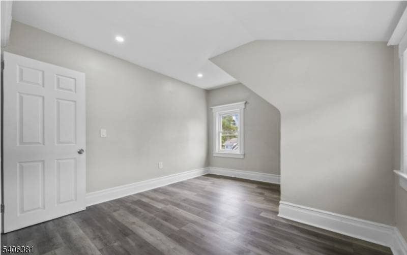 Beautifully maintained colonial style single family home on a quiet residential street in East Orange.