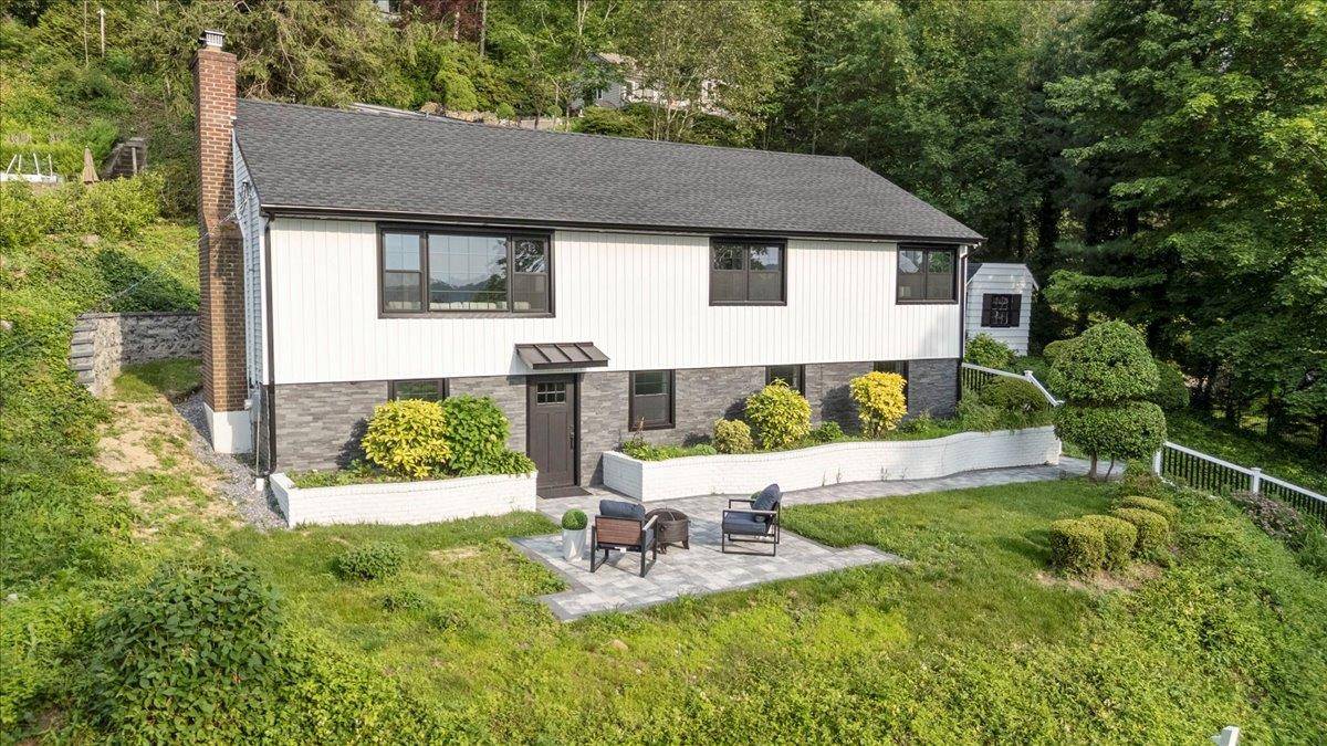 Welcome to Cold Spring Sunsets, where luxury meets tranquility in this completely renovated 4 bedroom, 2 bathroom waterfront retreat.