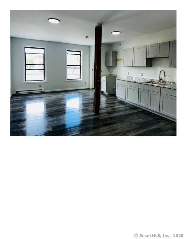 The NEWLY RENOVATED ELEVEN UNITS historic Morrison Hardware building is available.