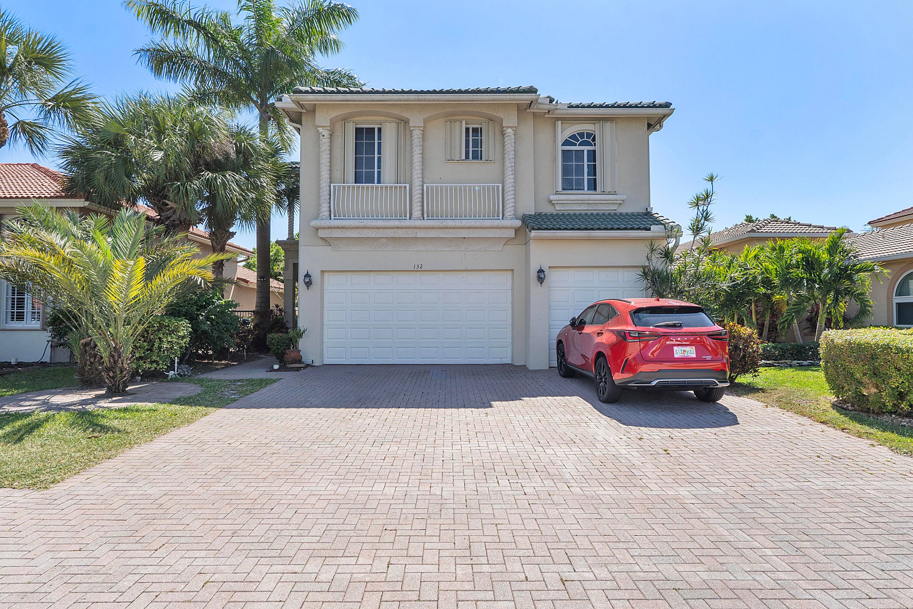 Gorgeous 5 bed 4 bath, 3 car garage Pool home with stunning Lake Views in the desired gated community of Bella Terra.