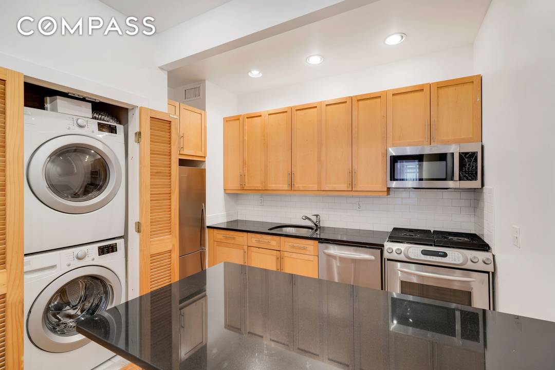 Spanning a generous 758 square feet, the sheer scale of this open loft style studio easily accommodates an enclosed sleeping alcove while maintaining its open concept flow.