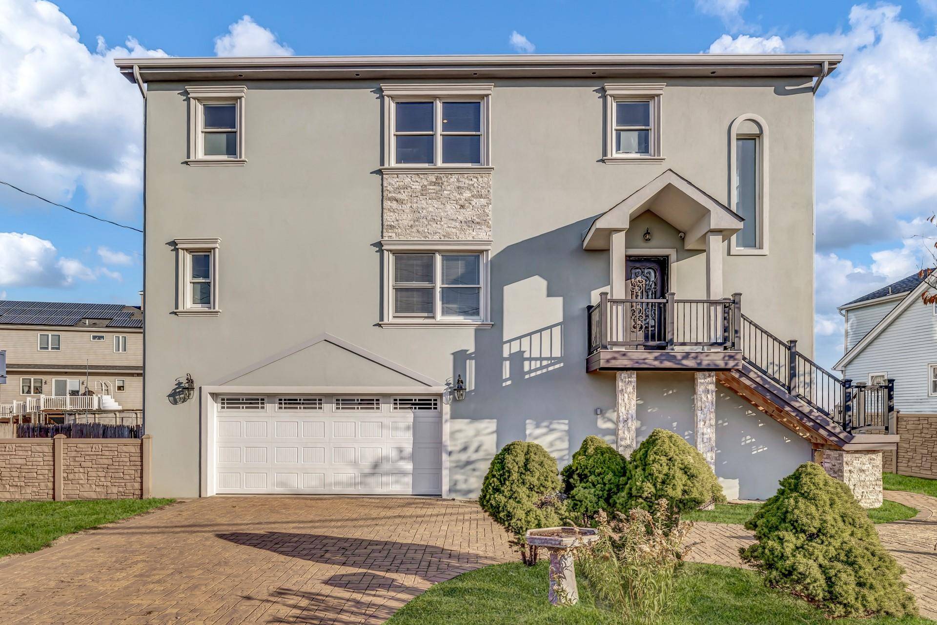 Presenting this exceptional custom built new construction boasting the latest technological advancements that ensure a high level of efficiency and safety against natural disasters.