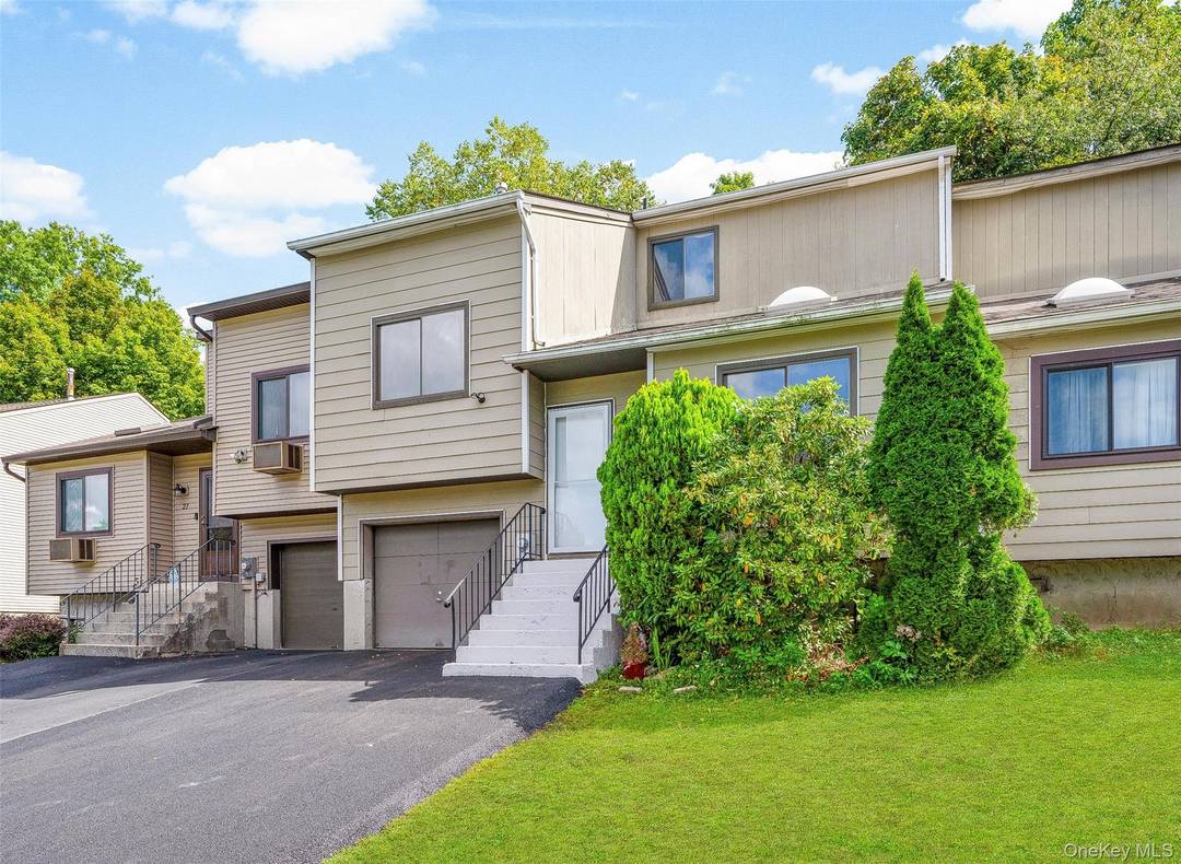Completely renovated contemporary townhouse located on a quiet cul de sac in the sought after Round Hill community in the Town of Fishkill.