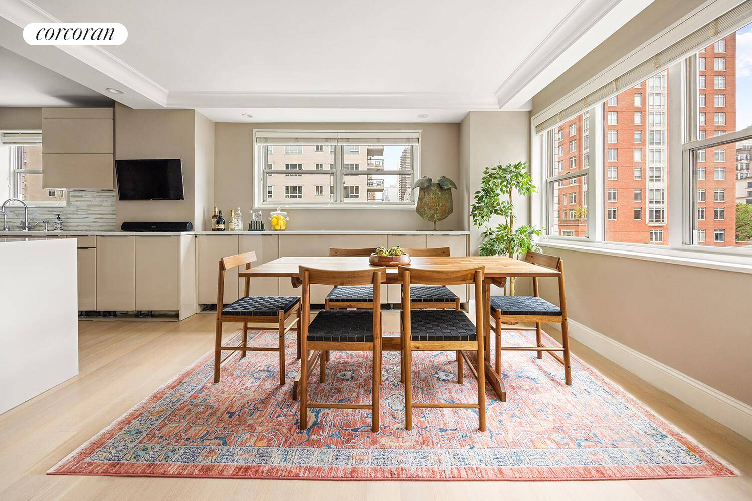 This elegantly renovated home features an open concept layout with south and west facing windows that flood the space with natural light throughout the day.
