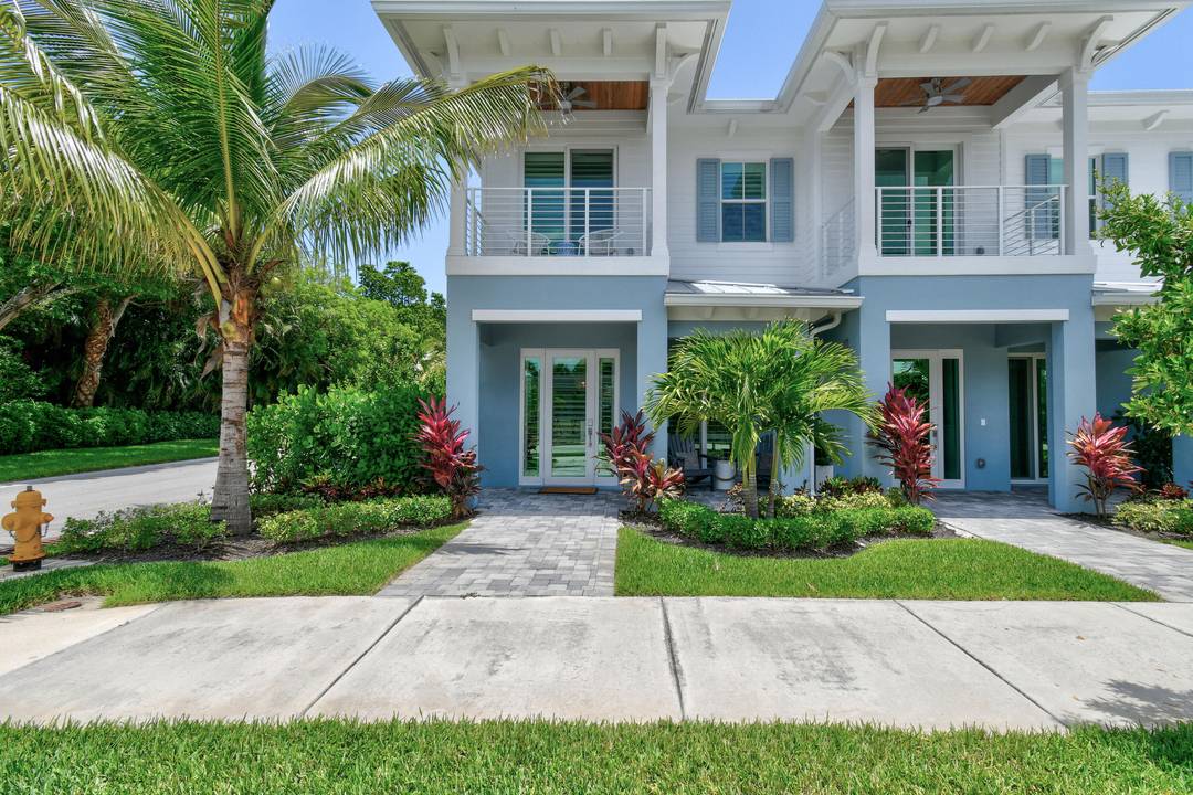 Live the dream in this stunning 2023 built waterfront townhome in beautiful StuartThis 3BR, 2.