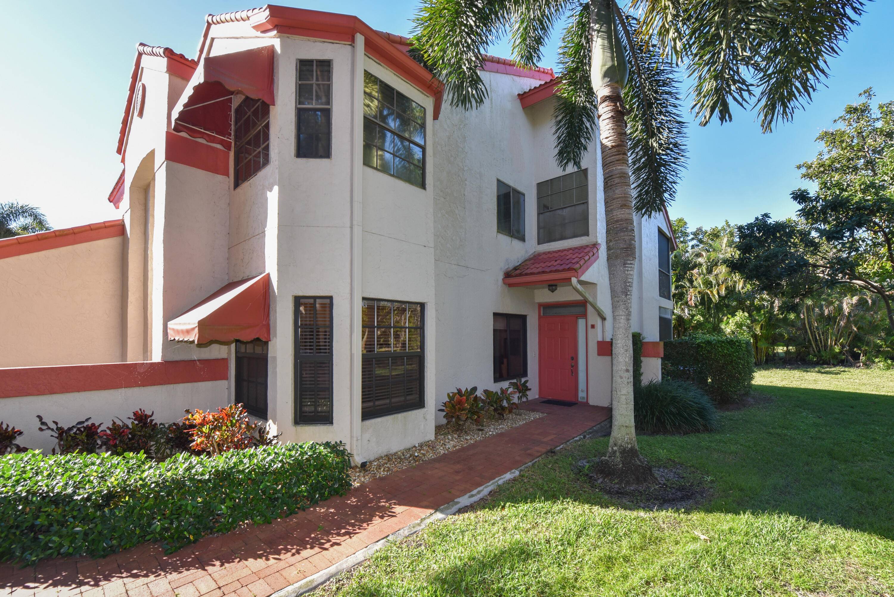 MOVE IN READY ! Spacious 2 Bed, 2 Bath 1st floor Corner Condo in Active 55 Community !