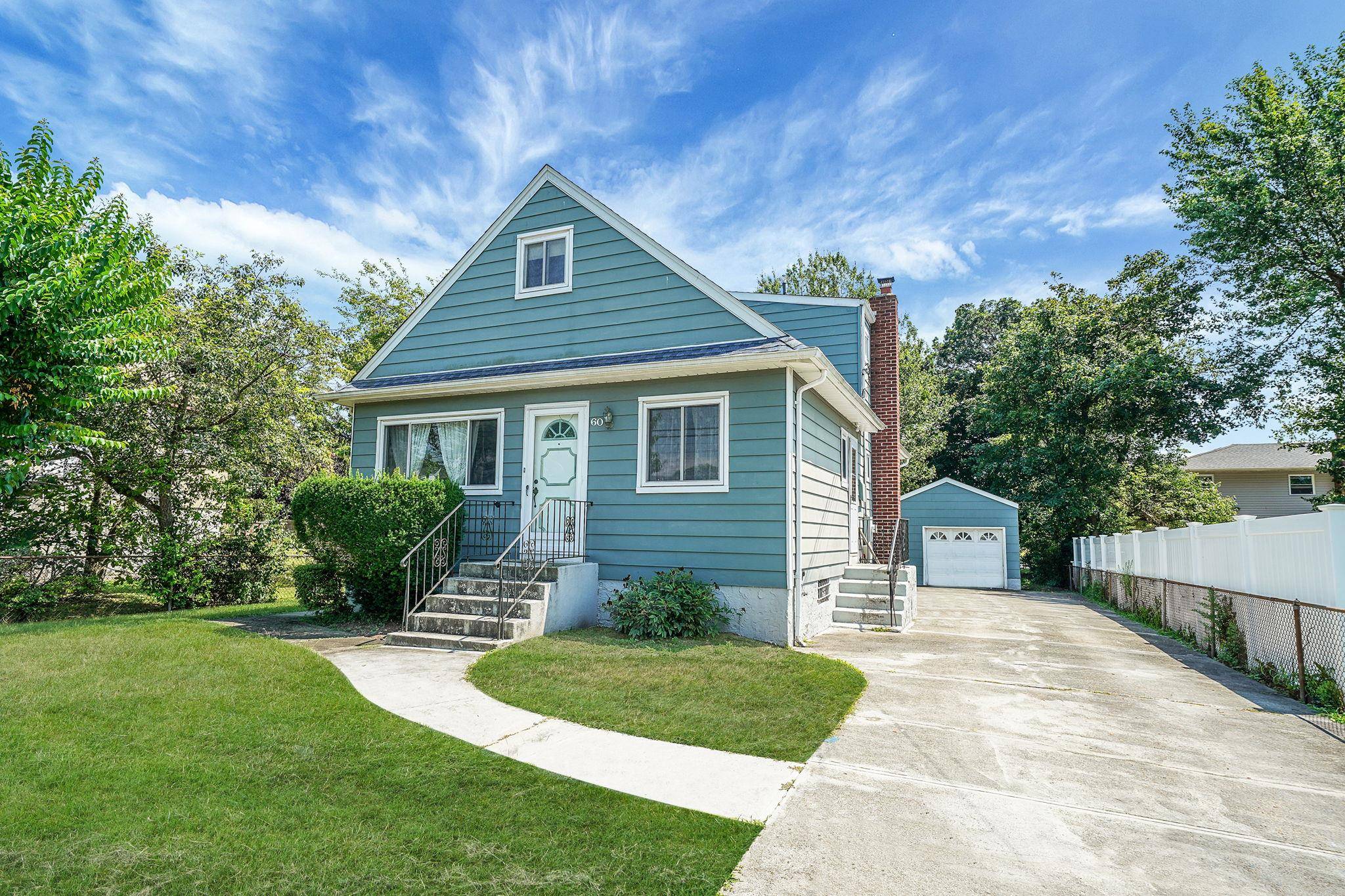 This 4 Bedroom, 2 Full Bath Cape features a classic layout with 2 bedrooms and a full bath on both the main level and second floor.