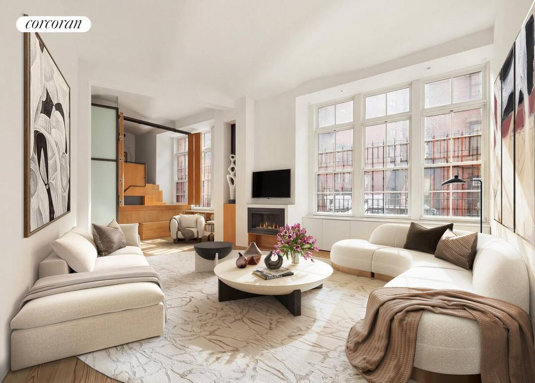 Welcome to Residence 1A at 720 Greenwich Street a truly special corner loft elevated above street level in the heart of the West Village.