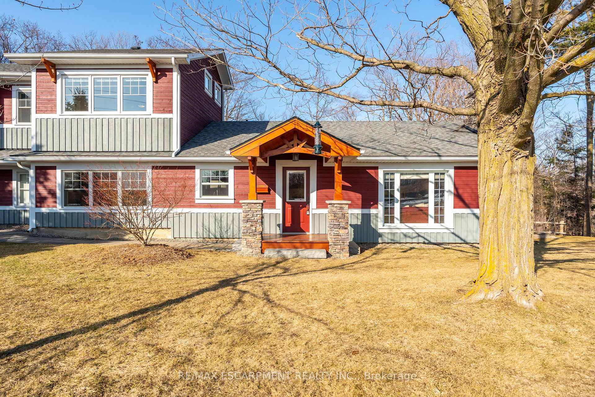 Discover 5433 Sixth Line, a 1 acre gem tucked away in Milton's picturesque countryside, perched above Sixteen Mile Creek.