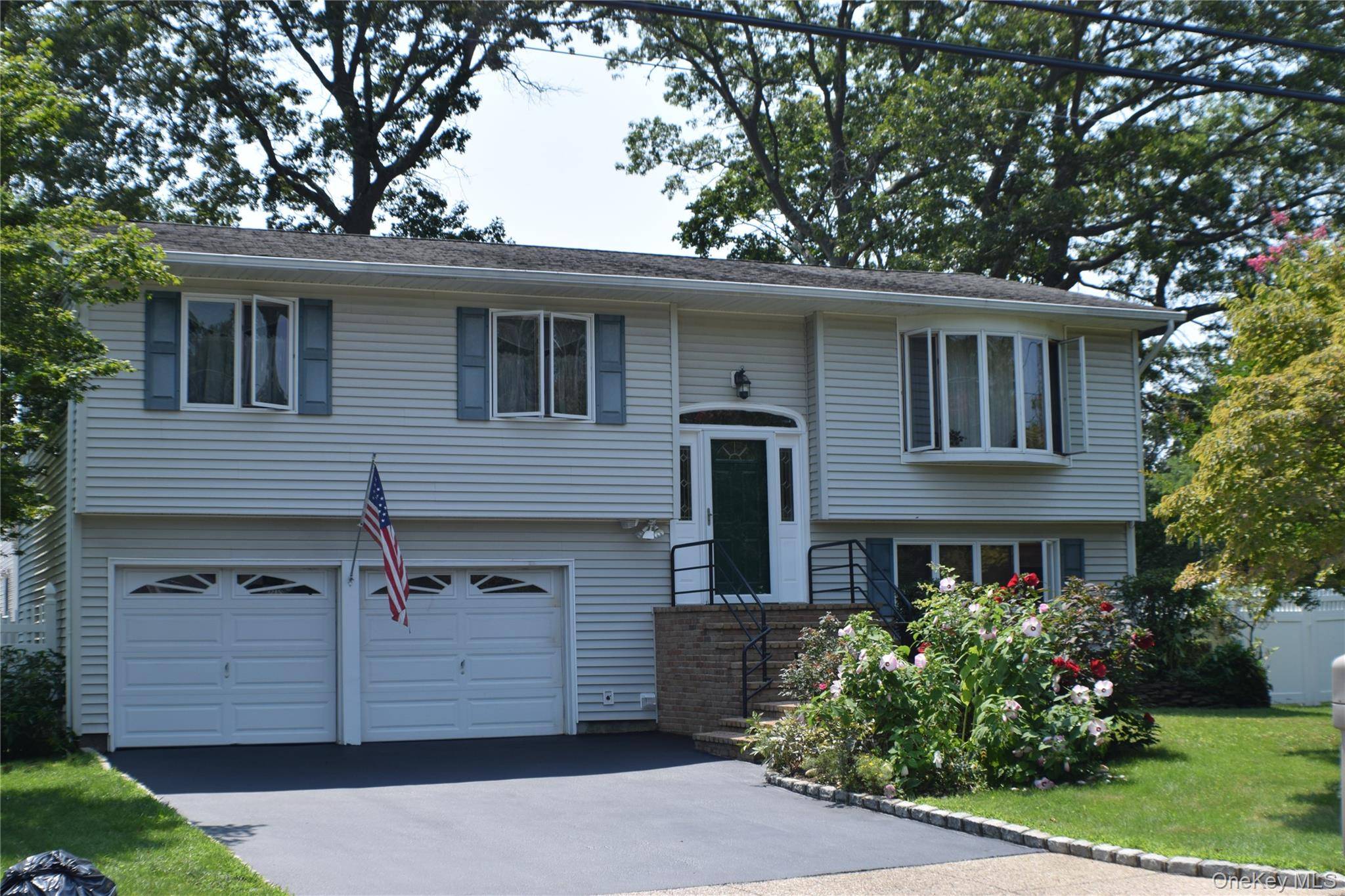 Beautifully maintained Hi Ranch featuring 4 bedrooms and 2 bathrooms with hardwood floors throughout.