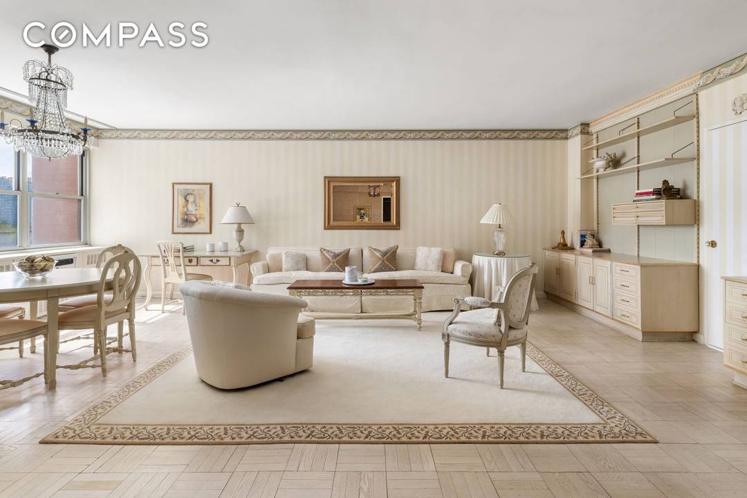 Residence 4I at 25 Sutton Place South is a bright, gracious home with stunning, unobstructed views of the East River and a peaceful outlook over the building's landscaped terrace garden.