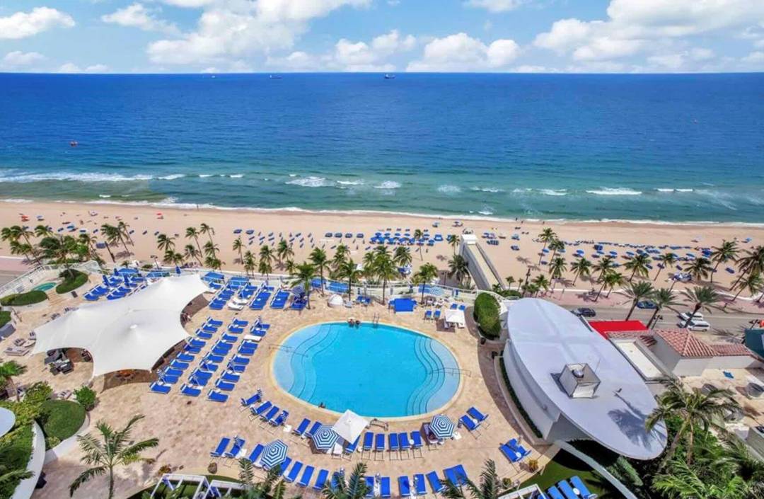 Direct Ocean views glimmer at entry of this Ritz Carlton Residential Suite.