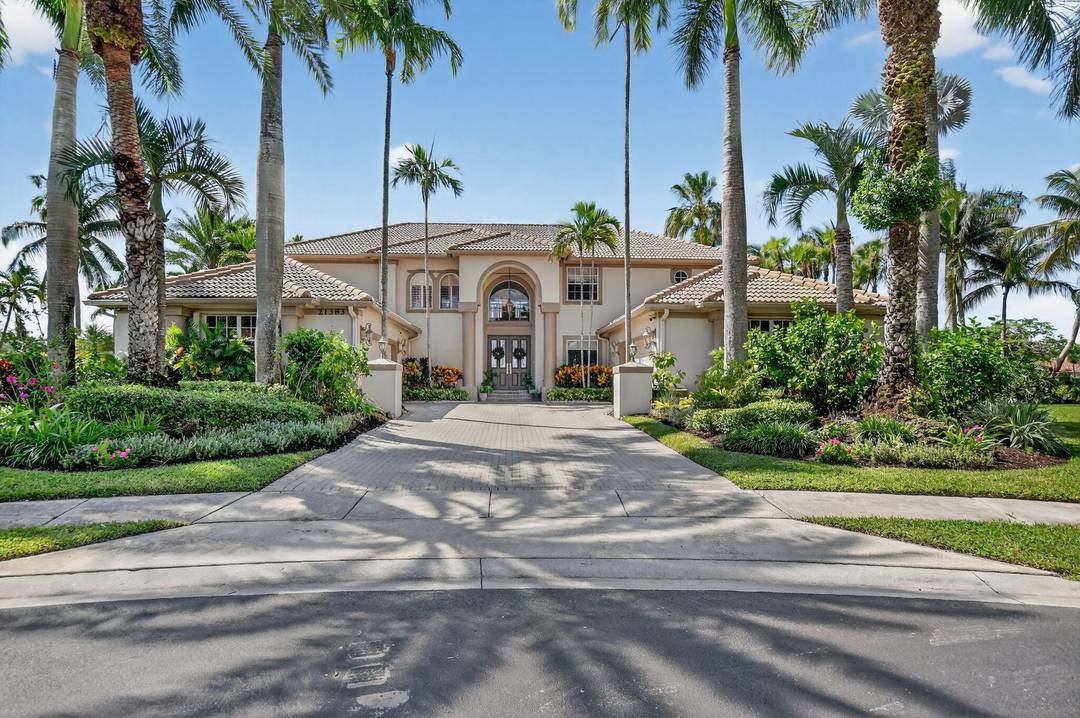 An incredible opportunity to live in this one of a kind 7 bedroom office estate, set on the largest lot in the prestigious Estates of Boca Falls.