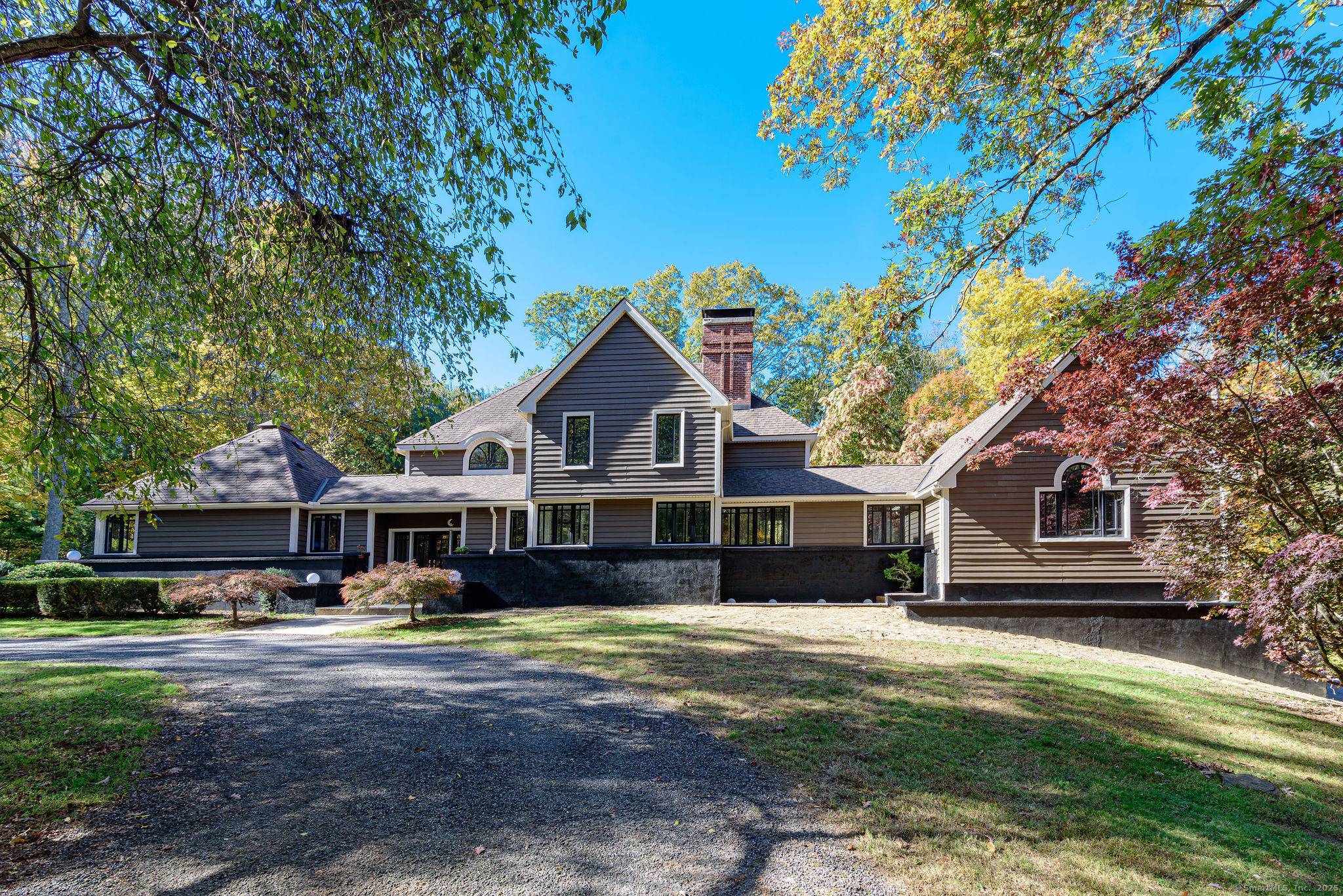 Beautiful 4 bedroom, 4 bath, 3739 sq ft contemporary home in a private setting on 10 acres.