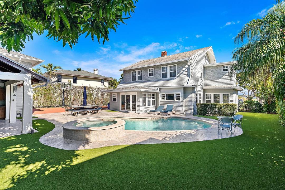 Welcome to your private coastal retreat in the heart of West Palm Beach perfectly positioned just steps from a scenic park and directly across from the sparkling Intracoastal Waterway.