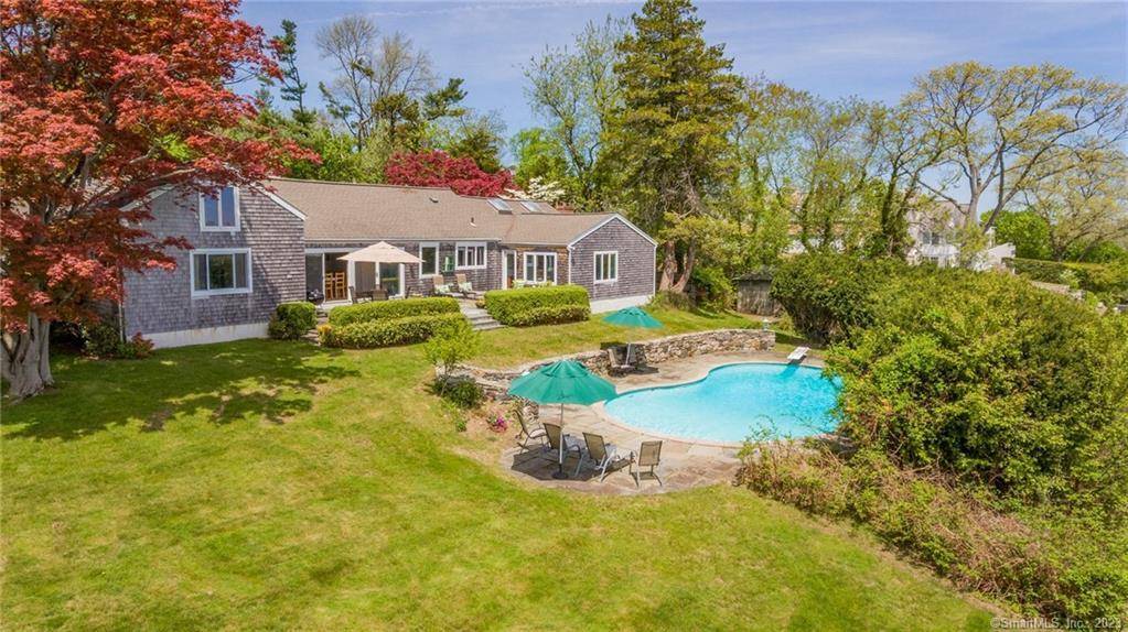 Furnished Yearly Rental with dramatic views of the Long Island Sound and pool at one of the areas premier addresses Steps To Compo Beach and Longshore Country Club.