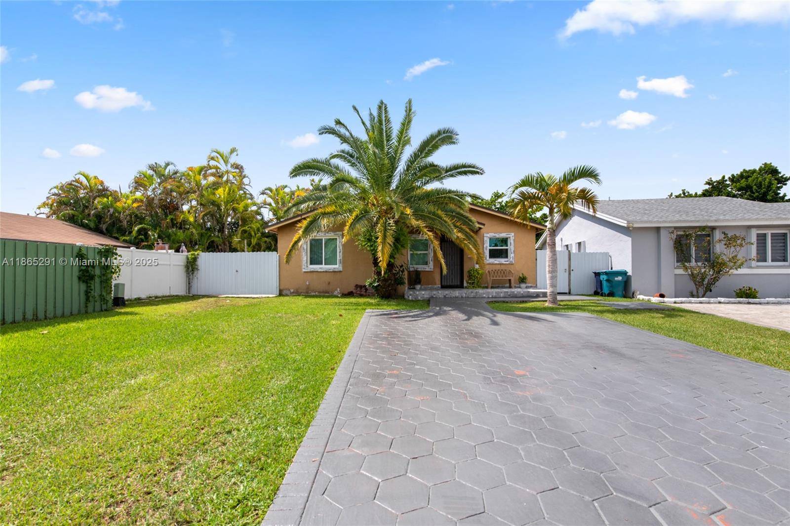 Pristine Corner Home tucked away on a quiet Cul de Sac.