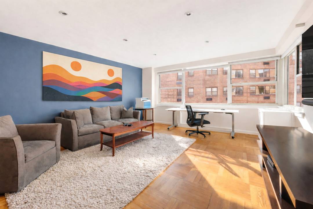 Flooded with natural light, this stunning corner studio boasts walls of windows with prized South and West exposures, delivering sunshine from morning through sunset.