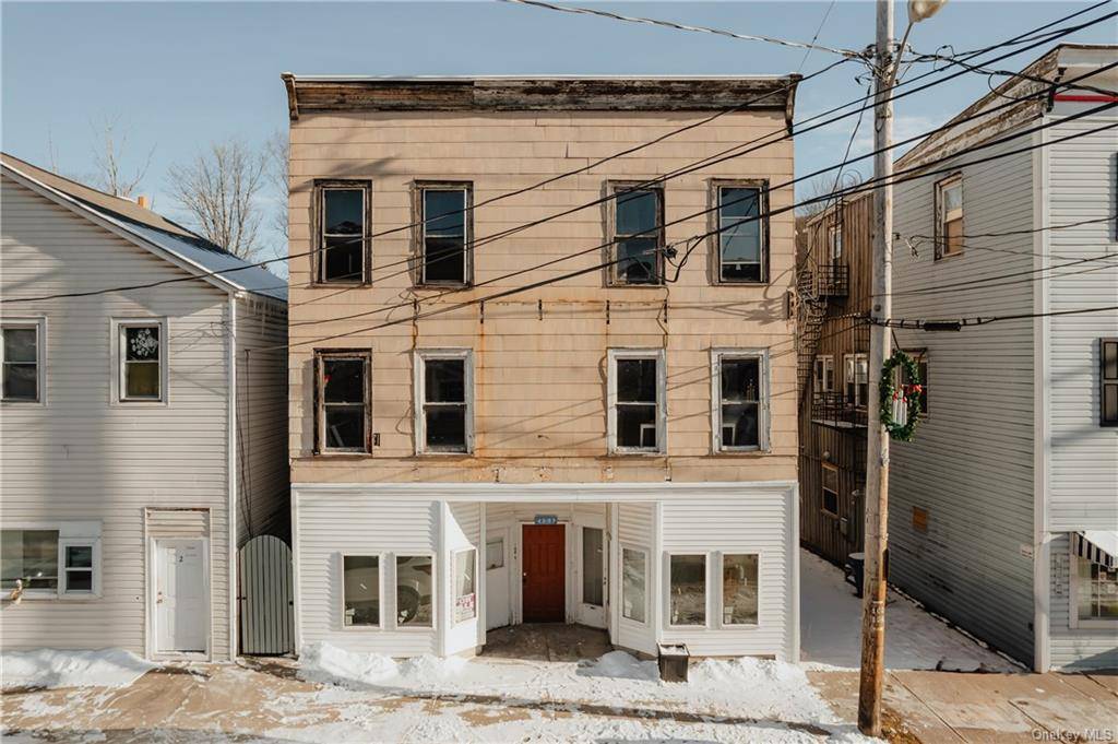 Calling all investors ! This three story, nearly 5, 500 square feet space has been totally gutted and is ready for your vision.