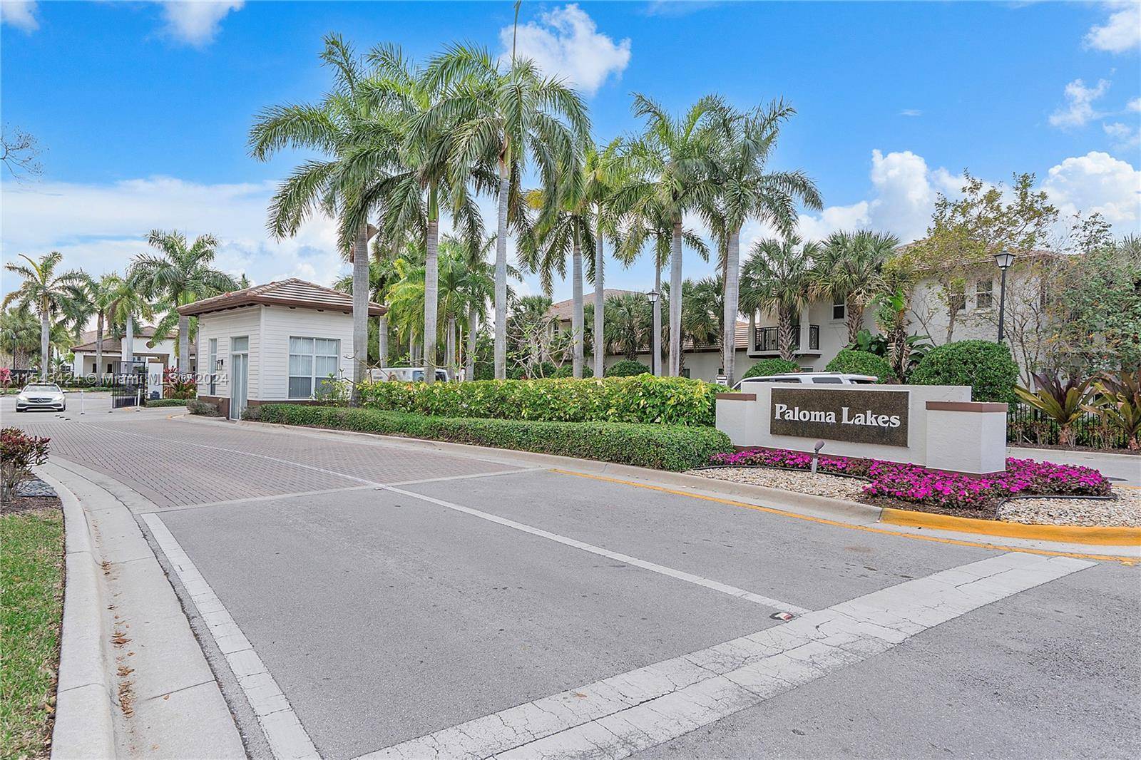 A must see ! ! Well maintained beautiful townhome in the gated community of Paloma lakes.