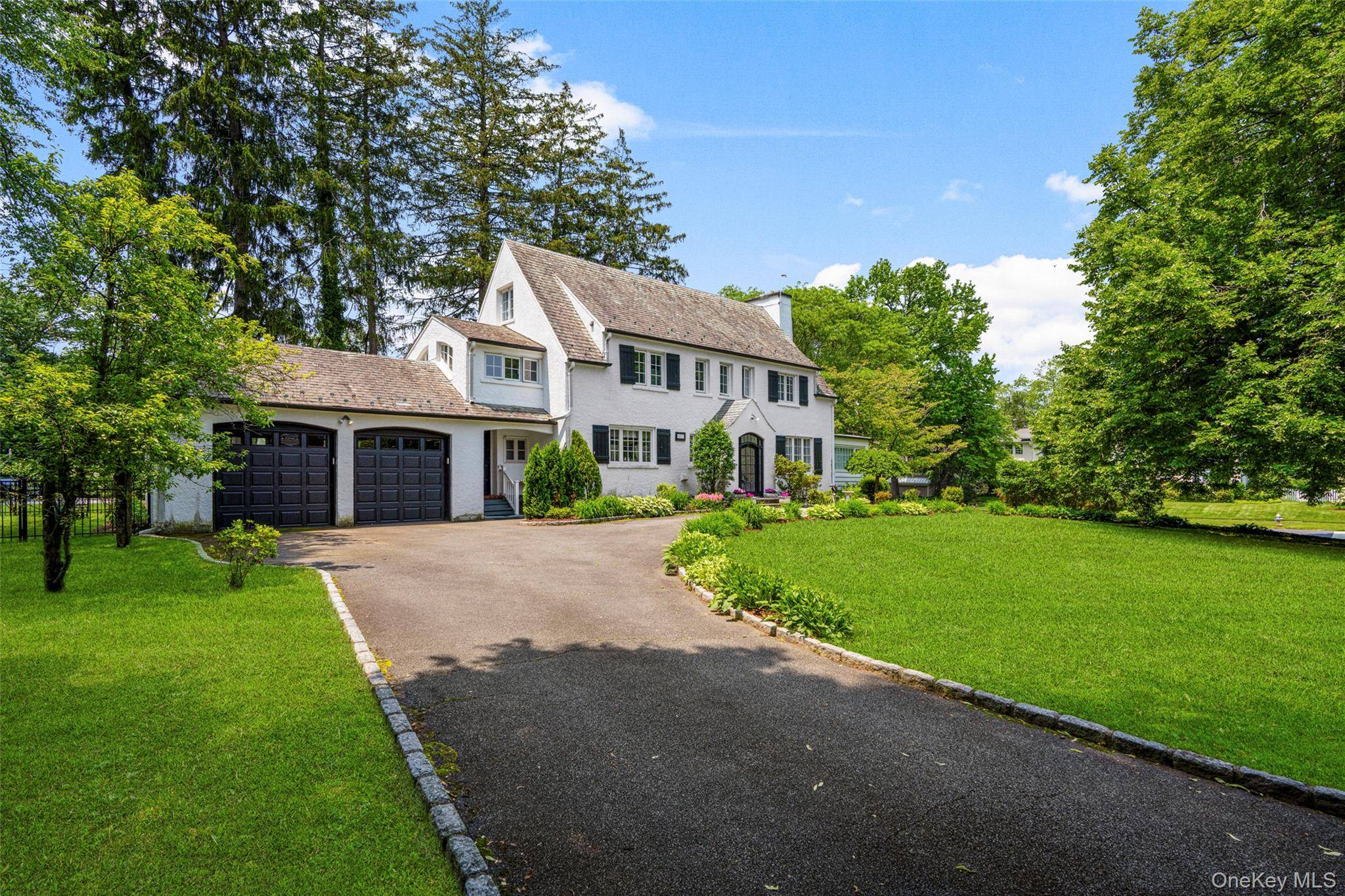 Welcome to 5 Antler Place, a charming Colonial on a corner lot that has been lovingly owned by the same family for over 40 years.