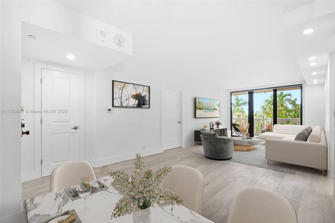 Stunning 2 bed 2 bath beautifully renovated offers a perfect blend of Modern Design and coastal charm.