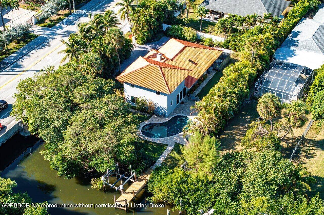 Charming Boutique Estate on Hypoluxo Island Perfect Blend of Luxury and Privacy Nestled on the tranquil lagoon side of Hypoluxo Island and overlooking a nature preserve, this exquisite gated estate ...