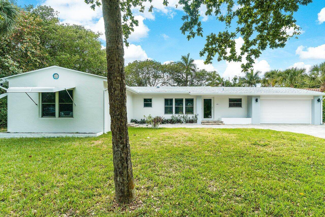 Coastal Modern Home with Soaring Natural wood Ceilings on Hypoluxo Island LOCATION !