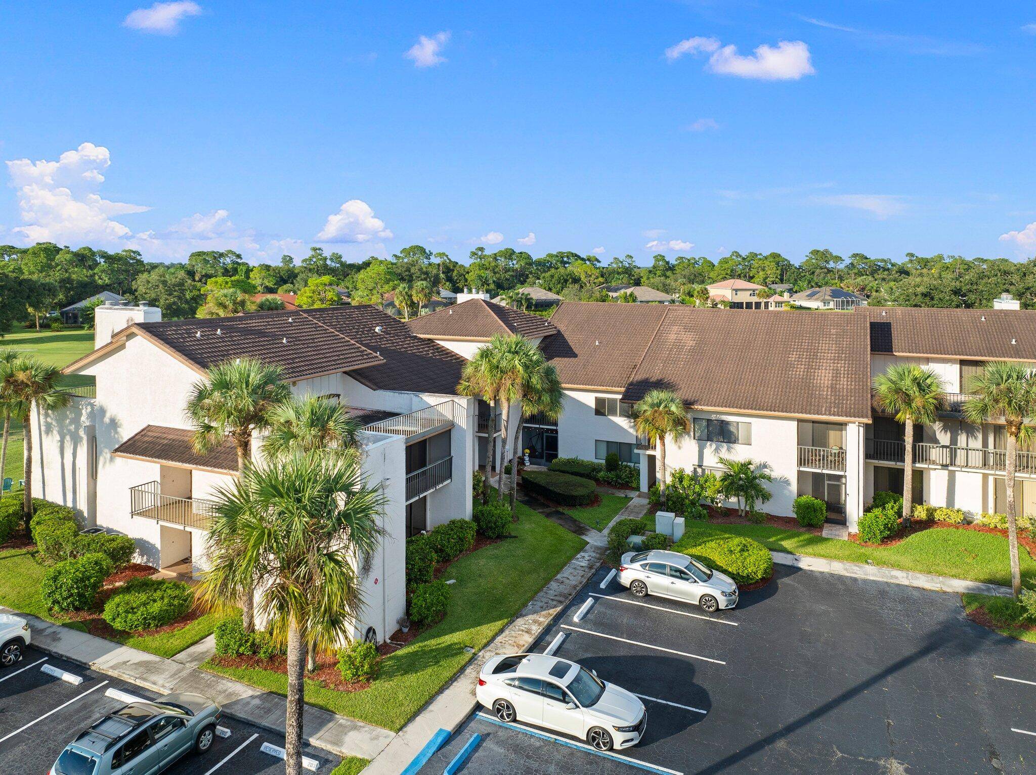 Rarely available 2 bedroom, 2 bathroom first floor corner unit condo with a garage for an extra 25K in the sought after gated Meadowood Golf and Tennis Club.