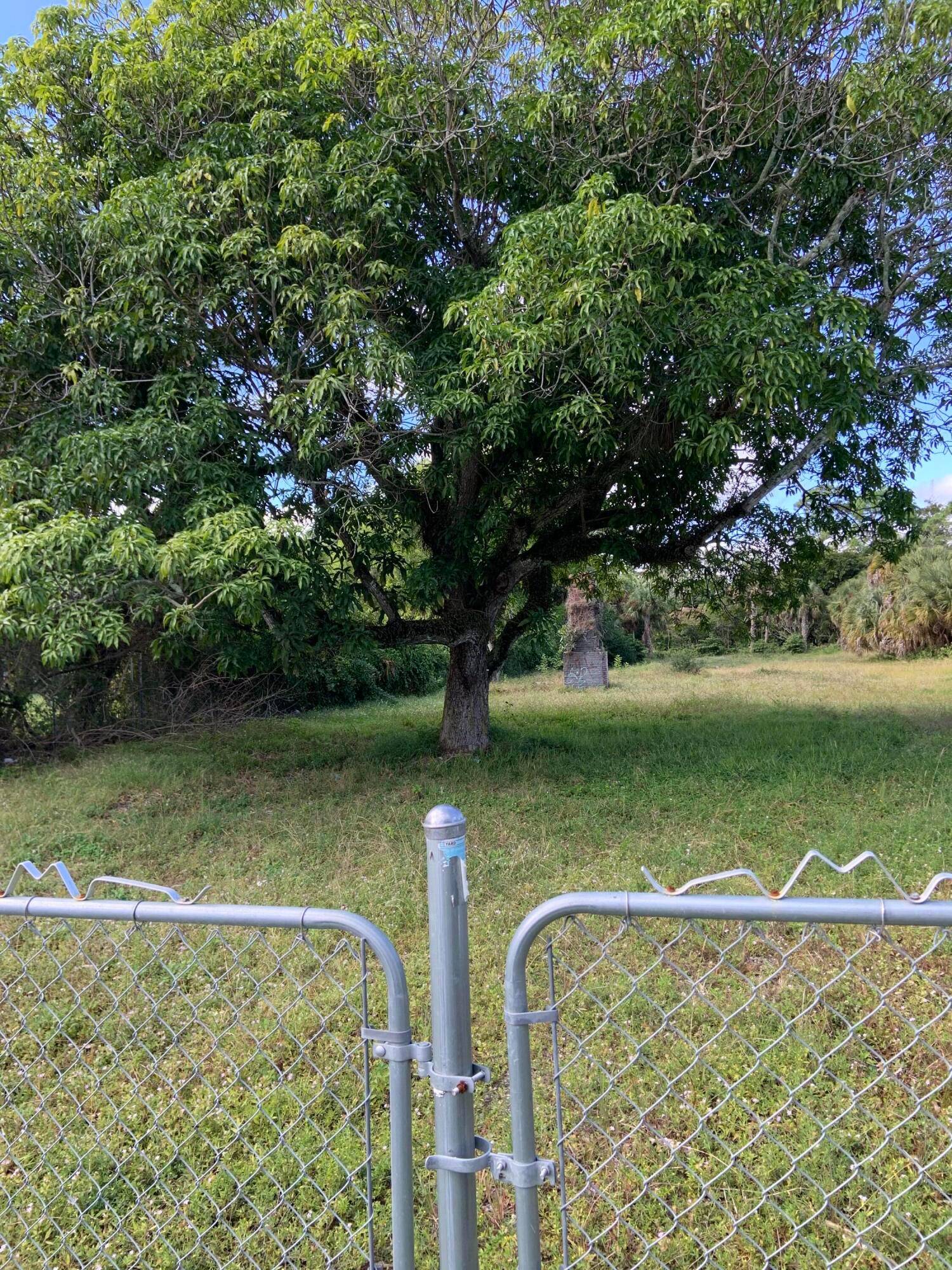 One of two. 32 acre land lots near PBIA, offers a prime location for building a beautiful residential home.