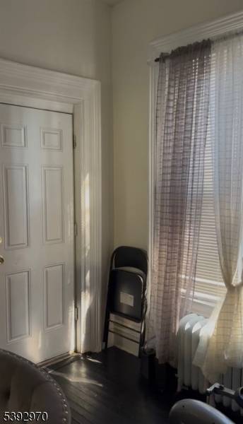 Welcome Home ; step right in to the experience at 53 Emmet St Newark minutes away from a vibrant downtown ; A charming 5 BR 2.