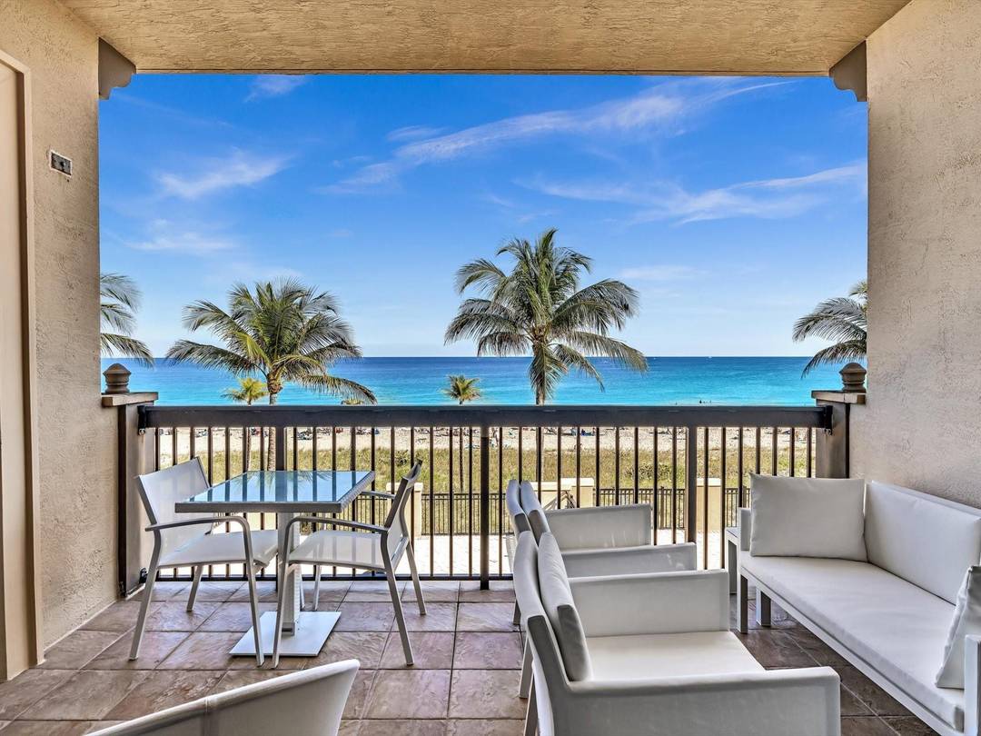 Indulge in refined coastal living in this DIRECT OCEANFRONT residence with sweeping Atlantic views.
