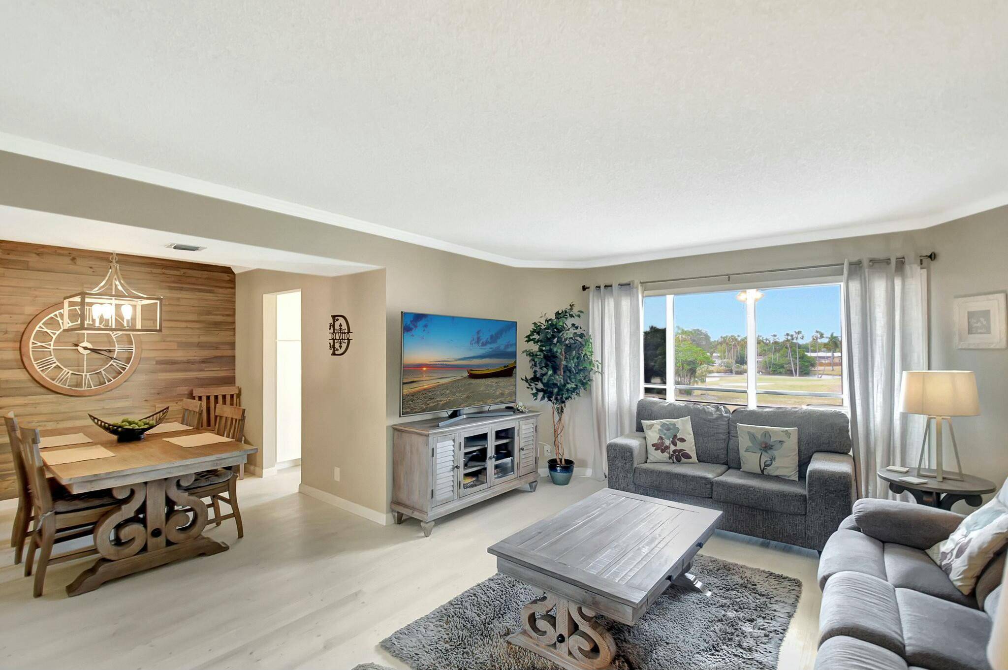 Come live the Florida lifestyle in this beautiful golf course view condo, located in the desirable 55 community of Poinciana Country Club.