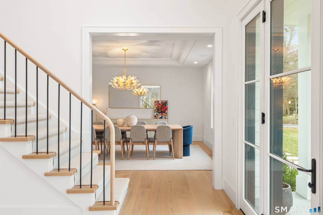 Stunning modern transitional home built by Compo Luxury Homes in 2024 and ideally located just minutes to downtown Westport, Compo Beach, and the train.