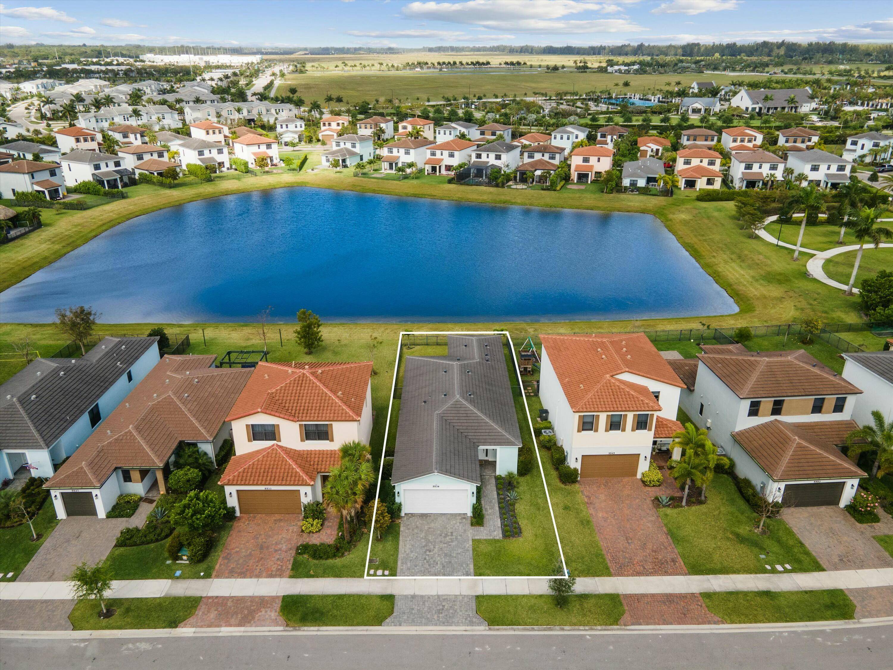 Welcome home to this immaculate Starfish model, featuring 3 bedrooms, 2 bathrooms, and a spacious 2 car garage, nestled in the sought after Skycove community of Westlake, FL.
