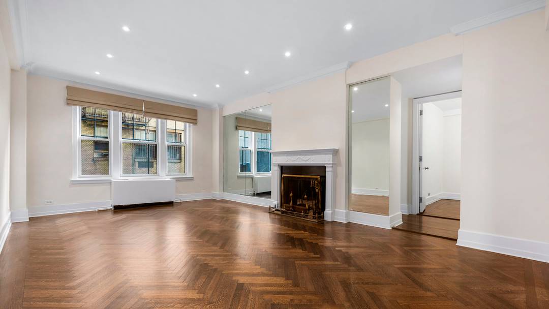 Renovated 2 bedroom, 1. 5 bath prewar condo in a white glove full service building.