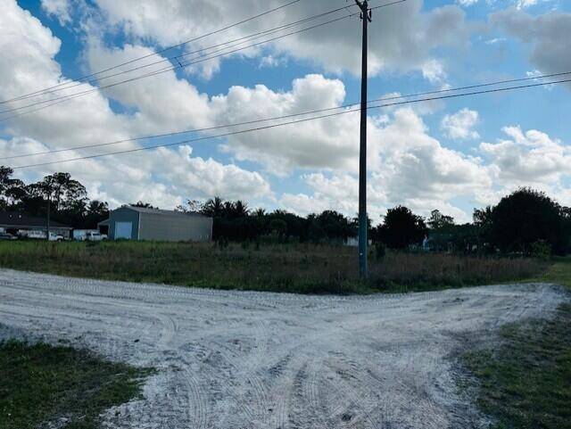 This expansive 1. 31 acre corner lot offers an ideal location for those seeking space, privacy, and potential.