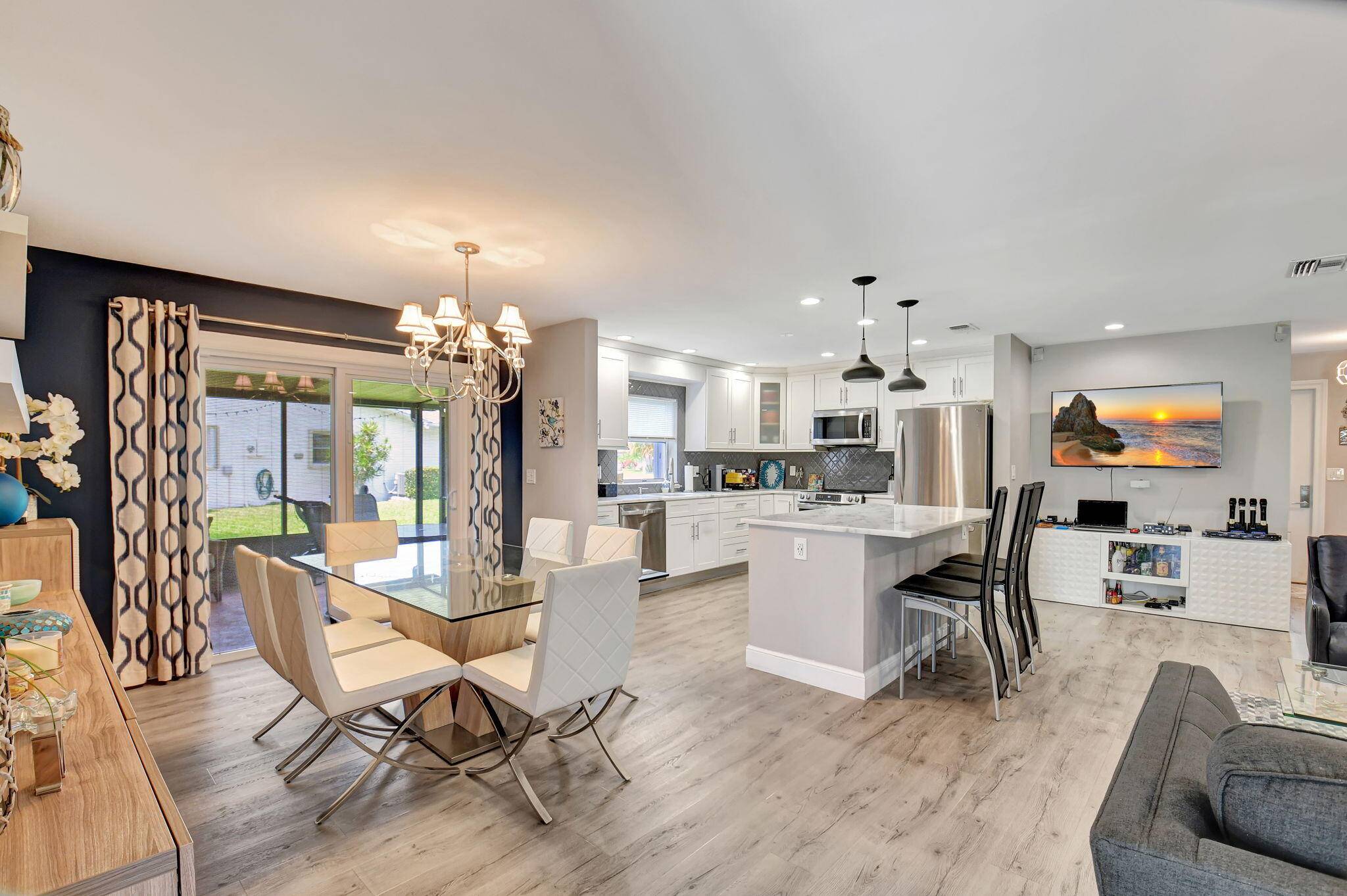Pride of ownership is evident from the moment you step into this remodeled 2BR 2BA den villa.