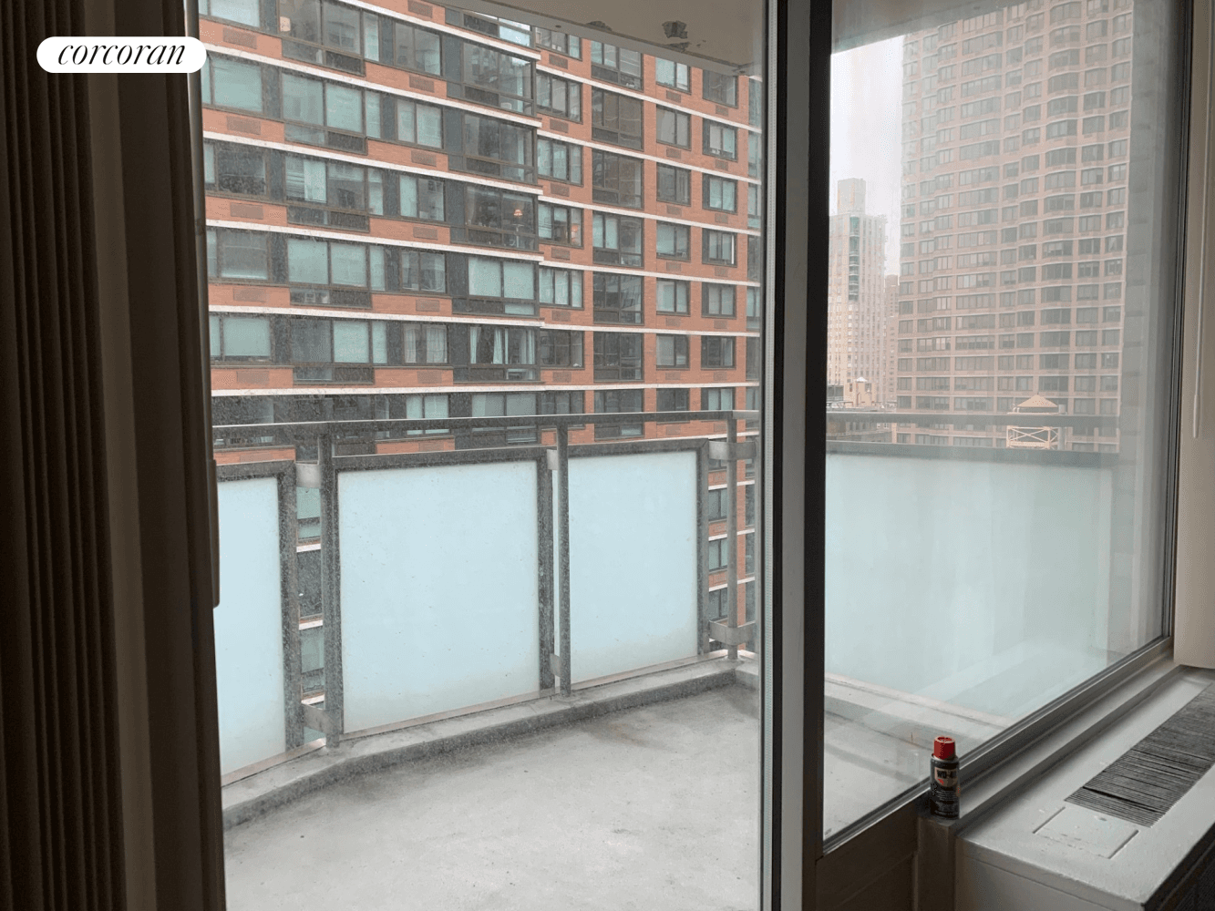 Large and bright two bedroom, one bath corner unit with balcony, where you can sit outside and enjoy your morning coffee with views of the water.